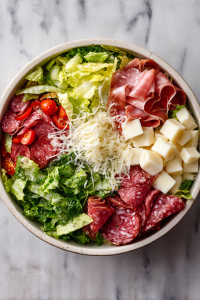 Cured Ensemble: Bring in the party of mortadella, ham, salami, and provolone to the romaine rendezvous.