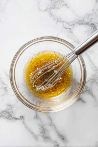 Single Layer Magic: Spread the seasoned bread cubes evenly on a spacious baking sheet.