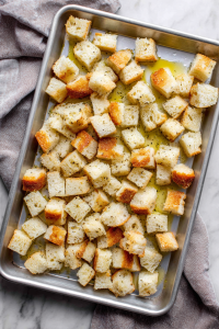 Cubed Bliss: Toss those bread cubes with a drizzle of olive oil and a pinch of salt.