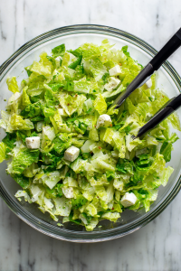 Leafy Waltz: Embark on the salad journey by tossing romaine with the delightful company of mozzarella or bocconcini.