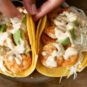 The image shows Baja Shrimp Tacos ready to serve