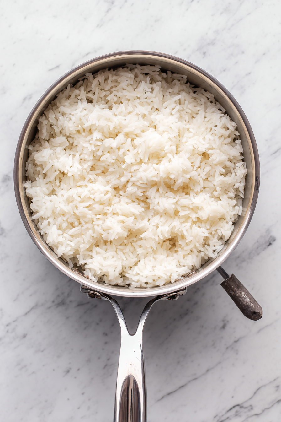 Let cooked rice rest for 15 minutes to cool and steam further.