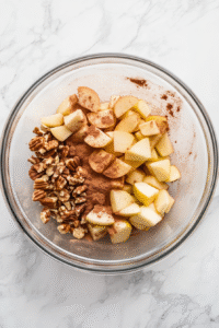 Add the ground cinnamon to the bowl and mix everything together.