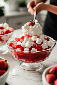 Adding Whipped Cream to Strawberry Jello Salad