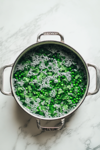 Blanching Peas and Fava Beans for Crispy Pork Chops with Pea Shoot Salad