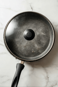 Let it simmer for 20-25 mins. Your rice should be cooked just right – tender and delicious. Take it off the heat, cover, and wait for 10 mins.