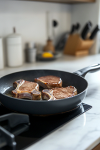 Preheating the Fry Pan with Oil for Crispy Pork Chops with Pea Shoot Salad