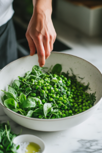 Preparing the Pea Shoot Salad for Crispy Pork Chops with Pea Shoot Salad