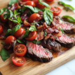 Slicing Seared Steaks and Preparing to Serve with Tomato Bacon Relish for the Bacon and Tomato Balsamic Steak Recipe