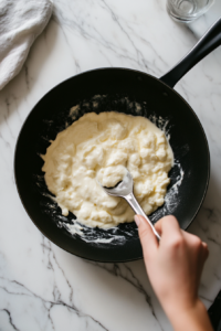 Squeezing Excess Water from Cooked Spinach for Vegetable Dip