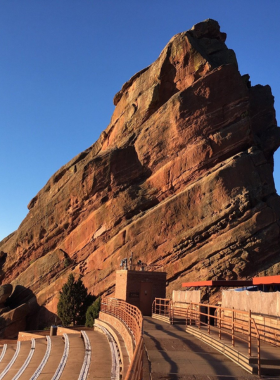 Spectacular_Landscape_View.jpg A breathtaking view of a spectacular landscape, featuring dramatic cliffs and lush vegetation. The photograph invites viewers to appreciate the natural beauty and grandeur of the environment.