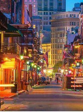 New_Orleans_Beignets_and_Coffee Plate of freshly made beignets dusted with powdered sugar, served with a cup of coffee, showcasing one of New Orleans' most iconic treats and the city’s café culture.