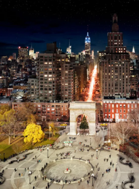 Washington_Square_Park_Christmas_Tree Festive scene at Washington Square Park, New York City, with a decorated Christmas tree beneath the park’s iconic arch, celebrating holiday traditions.