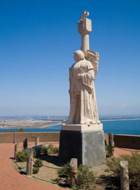 Statue of Juan Rodriguez Cabrillo at the Cabrillo National Monument in San Diego, overlooking the Pacific Ocean. The image shows the stone monument commemorating Cabrillo's exploration of California’s coast. Cabrillo National Monument is a historic site offering sweeping ocean views and insights into early exploration history.