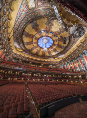 Historic Fox Theatre Interior The ornate interior of the historic Fox Theatre in Atlanta, with lavish decor, intricate ceiling designs, and grand seating areas, reflecting its Moorish and Egyptian architectural style.