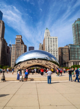  A stunning view of the Cloud Gate sculpture, popularly known as "The Bean," created by artist Anish Kapoor. The polished, reflective surface captures the skyline of Chicago and the surrounding environment, showcasing its iconic shape. This photograph, taken in September 2024, highlights one of Chicago's most beloved attractions, which draws visitors for its unique design and interactive experience. The sculpture is situated in Millennium Park, serving as a centerpiece for art and culture in the city.