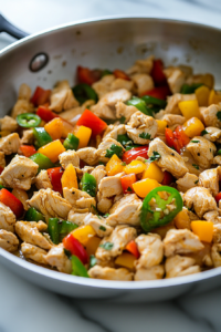 Adding Chicken Stock Cube and Vegetables to Cajun Chicken Pasta