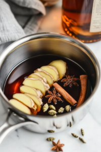 Infusing Spices and Ginger in Spiced Cognac for a Flavored Cocktail Base