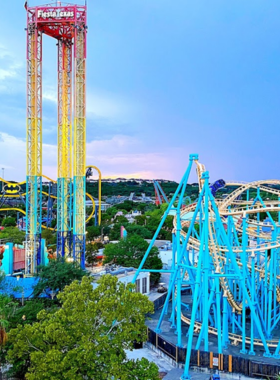 A serene outdoor dining area overlooking a river, lined with lush trees and greenery. Tables and chairs are set up along the waterfront, creating a peaceful atmosphere for relaxation. A serene outdoor dining area overlooking a river, lined with lush trees and greenery. Tables and chairs are set up along the waterfront, creating a peaceful atmosphere for relaxation.