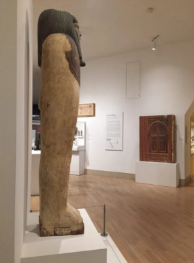 Dallas_Museum_of_Art_Interior_Gallery.jpg A quiet gallery space in the Dallas Museum of Art, with an art exhibit, minimalist décor, and soft lighting creating a contemplative atmosphere."