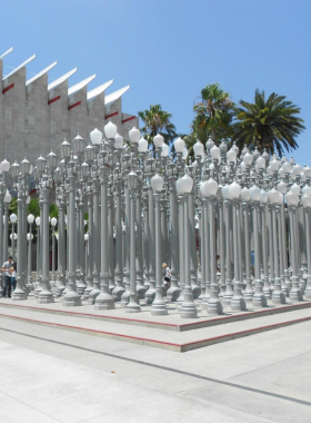 &ldquo;The Los Angeles County Museum of Art (LACMA), showcasing iconic art installations and cultural exhibits on a sunny day.&rdquo;