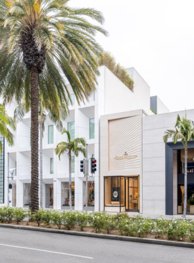 &ldquo;Exterior of a Chanel boutique with elegant window displays, showcasing luxury fashion in a modern retail space.&rdquo;