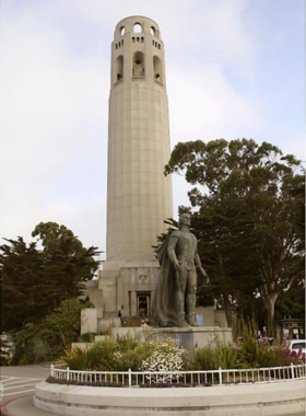 Coit_Tower_San_Francisco.jpg Coit Tower standing proudly atop Telegraph Hill, surrounded by vibrant gardens and the city of San Francisco in the background. The white structure is a prominent landmark against the blue sky, symbolizing the city’s rich history.