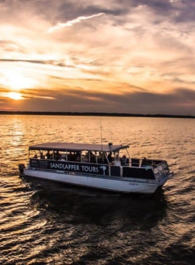 Aerial_View_of_Charleston_Waterfront.jpg An aerial perspective of Charleston’s waterfront, showcasing the scenic river and historic architecture along the shoreline. The image illustrates the city’s connection to the water, with boats and green spaces adding to the charm.