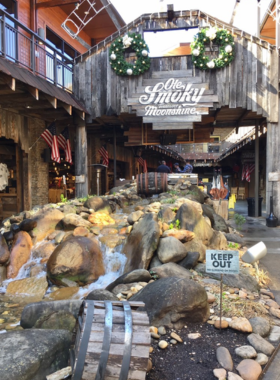 Ole Smoky Distillery Entrance The charming entrance of Ole Smoky Distillery, inviting visitors to explore the world of moonshine. The rustic design and festive decorations reflect the lively spirit of this popular attraction in Gatlinburg.