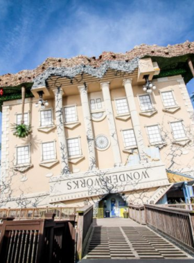 WonderWorks_Myrtle_Beach_Boardwalk WonderWorks located along the Myrtle Beach Boardwalk, with the building standing out in its unique upside-down design. Visitors enjoy interactive exhibits and thrilling activities in this popular family-friendly attraction.