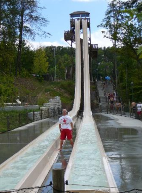 Splash_Country_Water_Slide A thrilling tall water slide at Splash Country water park in Pigeon Forge. The slide twists and turns, providing a refreshing and exciting experience for park visitors.