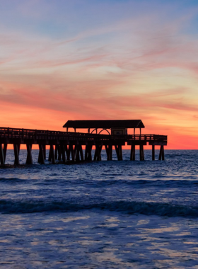 tybee-island-savannah.jpg "Tybee Island beach near Savannah, known for its sandy shores, iconic lighthouse, and family-friendly beach activities."