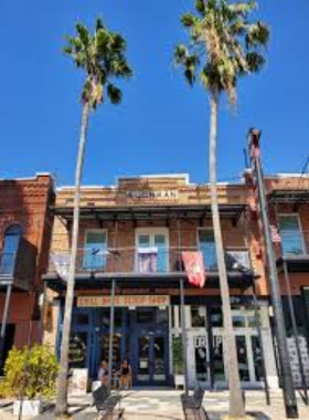 Historic Buildings in Ybor City A view of the charming, historic brick buildings in Ybor City, lined with shops and restaurants, with people walking along the cobblestone streets enjoying the lively atmosphere.