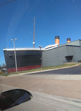 titanic-museum-branson.jpg" This image shows that the Titanic Museum in Branson features a large-scale replica of the ship, with interactive exhibits and historical artifacts."