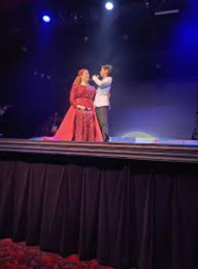 "dutton-family-theater.jpg" "This image shows that the Dutton Family Theater hosts lively music and dance performances in Branson, perfect for family entertainment."