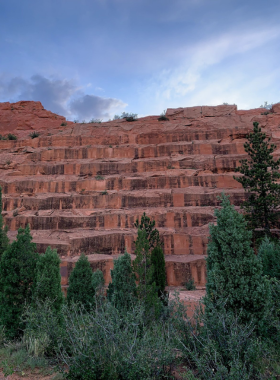 red-rock-canyon-sandstone-formation.jpg This image shows the striking red sandstone formations of Red Rock Canyon Open Space, with visitors hiking along the trails and enjoying the scenery.