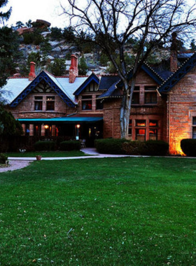 briarhurst-manor-estate-dining-room.jpg This image shows the elegant dining room inside Briarhurst Manor Estate, with vintage furnishings and a cozy ambiance perfect for a fine meal.