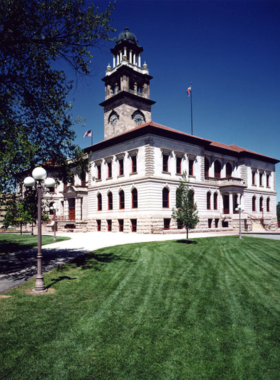 colorado-springs-pioneers-museum-exhibit.jpg This image shows an exhibit at the Colorado Springs Pioneers Museum, featuring historical artifacts from the city's early days and its development.