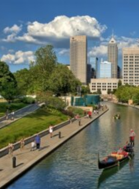 Central Canal Walkway with Pedal Boats "This image shows people enjoying a serene stroll and pedal boating along the Central Canal in downtown Indianapolis."
