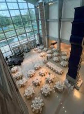 Indiana State Museum Entrance "This image shows the Indiana State Museum’s main entrance with flags and banners welcoming visitors to explore state history."