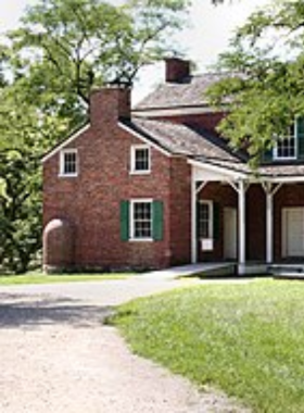 Conner Prairie Living History Museum with Costumed Interpreter This image shows a costumed interpreter at Conner Prairie, demonstrating pioneer life at the living history museum."