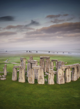 Stonehenge Circle This image shows the mysterious ancient stone circle of Stonehenge in a green, open landscape.