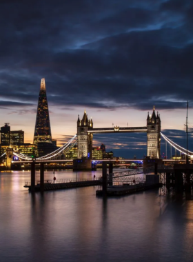 Tower Bridge with Thames River This image shows Tower Bridge over the River Thames, a symbol of London with its Victorian architecture.