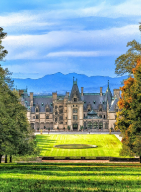 Biltmore Estate Gardens "This image shows the beautifully landscaped gardens of Biltmore Estate, with vibrant flowers, neatly trimmed hedges, and scenic pathways."