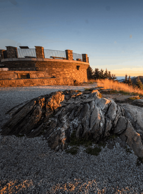 Great Smoky Mountains National Park- 2024-11-12T122347.140 "This image shows a misty morning in the Great Smoky Mountains National Park, with towering trees and a tranquil stream."