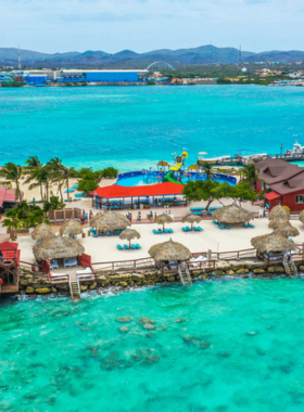 de-palm-island-aruba-family-fun.jpg This image shows that De Palm Island in Aruba is a family-friendly resort, offering water slides, snorkeling, and zip-lining, making it a great destination for all ages to enjoy.