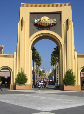 Universal Studios Florida "This image shows the thrilling attractions at Universal Studios Florida, with roller coasters, movie-themed rides, and excited visitors exploring the park's immersive world of entertainment."