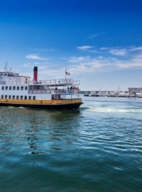 3. Casco Bay Cruise This image shows a cruise boat sailing through the beautiful Casco Bay, offering views of Portland’s harbor and surrounding islands under a bright blue sky.