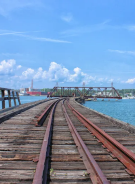 7. Maine Narrow Gauge Railroad This image shows a vintage train traveling on the Maine Narrow Gauge Railroad, offering visitors scenic views of Portland’s coastline and harbor.