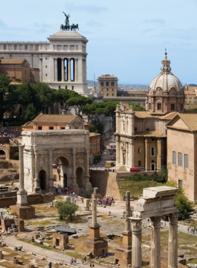 Stroll Through the Roman Forum This image shows the Roman Forum with ancient ruins of temples, arches, and structures, highlighting the core of Roman public life.